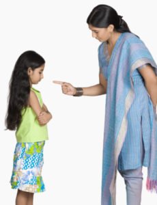 Side profile of a young woman scolding her daughter