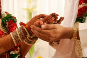The Hands Of An Indian Gujarati Bride And Bridegroom, A Ritual Performed In An Indian Gujarati Wedding, India